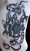 tribal dragon picture tattoo